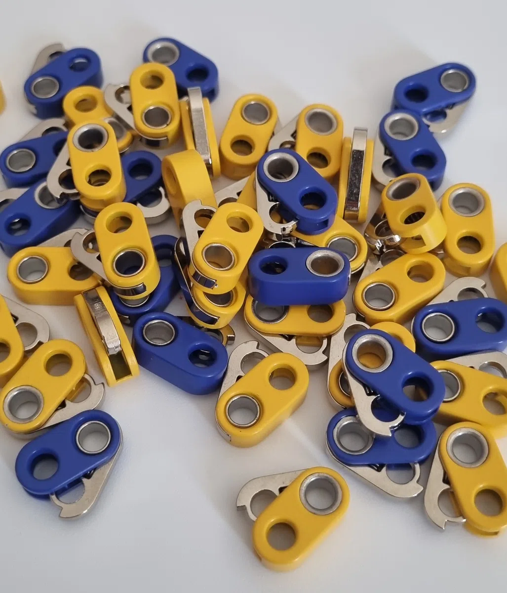 Stoper metal 9 x 18 mm otwór 4 mm żółty